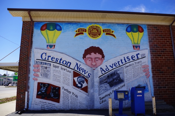 Mural on the side of the local newspaper publishing building painted by the SWCC Art Club. 